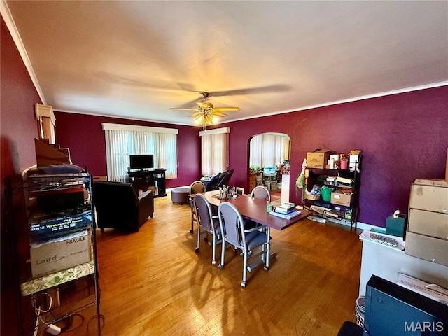 210 Linn St, Belle, MO 65013 - dining space featuring wood finished floors, ornamental molding, and ceiling fan