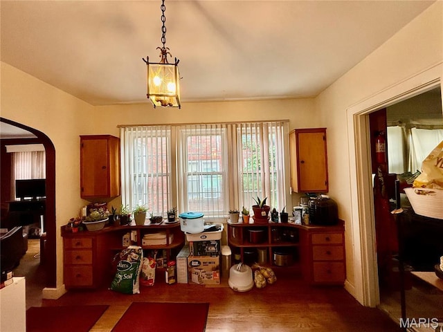 210 Linn St, Belle, MO 65013 - dining area featuring wood finished floors and arched walkways