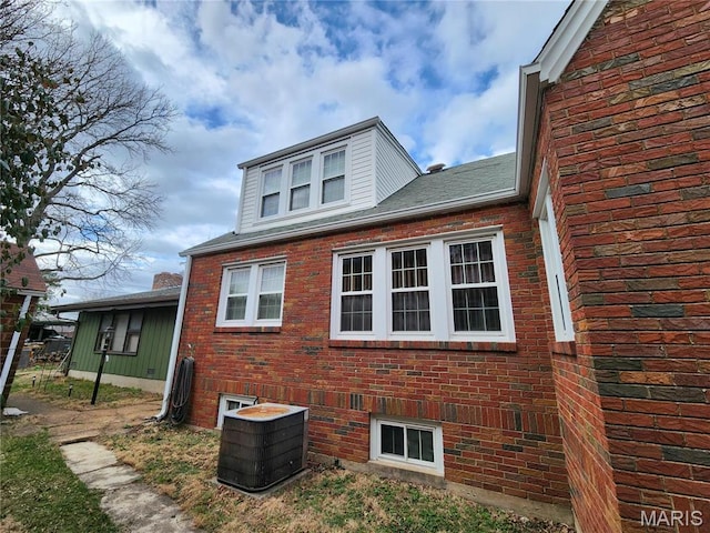 210 Linn St, Belle, MO 65013 - view of side of home with brick siding