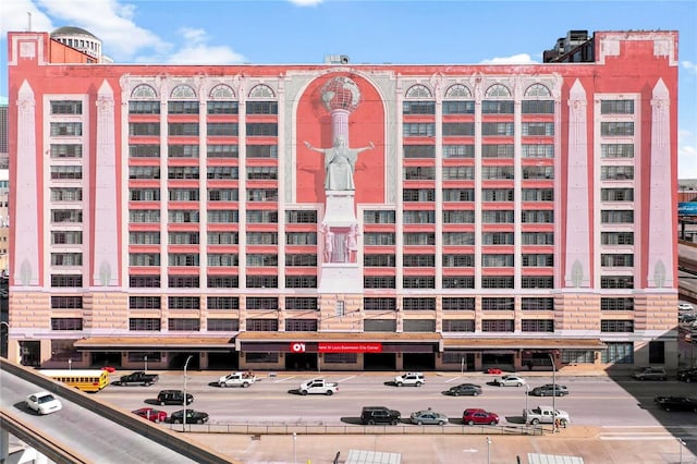 view of property with uncovered parking
