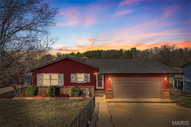 207 Normandie Dr, Bonne Terre, MO 63628 - view of front of home with concrete driveway, brick siding, an attached garage, and roof with shingles