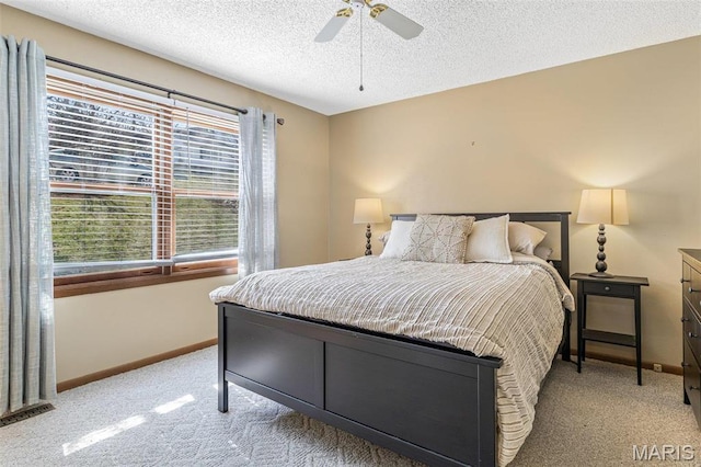 207 Normandie Dr, Bonne Terre, MO 63628 - bedroom featuring light carpet, a textured ceiling, and a ceiling fan