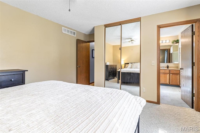 207 Normandie Dr, Bonne Terre, MO 63628 - carpeted bedroom featuring a closet and a textured ceiling