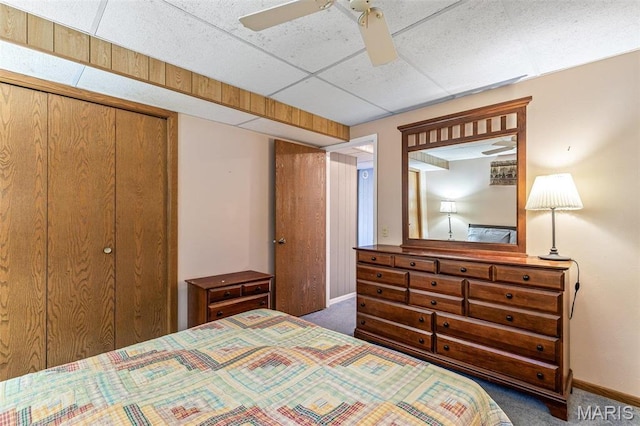 207 Normandie Dr, Bonne Terre, MO 63628 - carpeted bedroom featuring a closet, a ceiling fan, and a drop ceiling