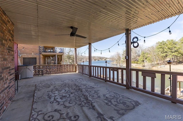 207 Normandie Dr, Bonne Terre, MO 63628 - view of patio / terrace featuring a water view and a ceiling fan