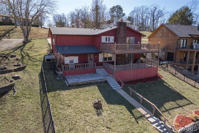 207 Normandie Dr, Bonne Terre, MO 63628 - back of property featuring a deck, a chimney, and stairs