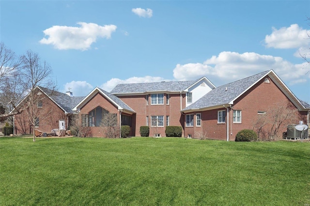 900 Deer Circle Dr, Carlyle, IL 62231 - view of front of home with a front yard and brick siding