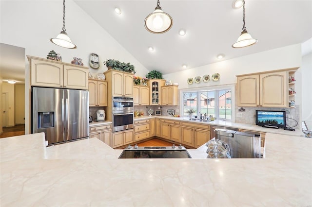 900 Deer Circle Dr, Carlyle, IL 62231 - kitchen with stainless steel appliances, a sink, tasteful backsplash, light brown cabinets, and high vaulted ceiling