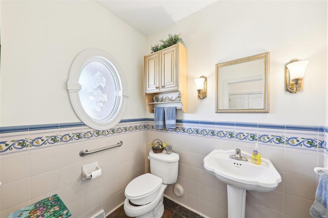 900 Deer Circle Dr, Carlyle, IL 62231 - bathroom with toilet, a wainscoted wall, and tile walls