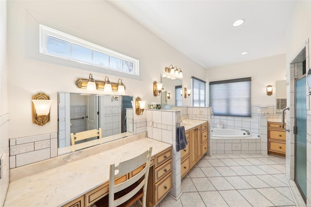 900 Deer Circle Dr, Carlyle, IL 62231 - bathroom featuring tile patterned floors, a garden tub, vanity, a shower stall, and recessed lighting