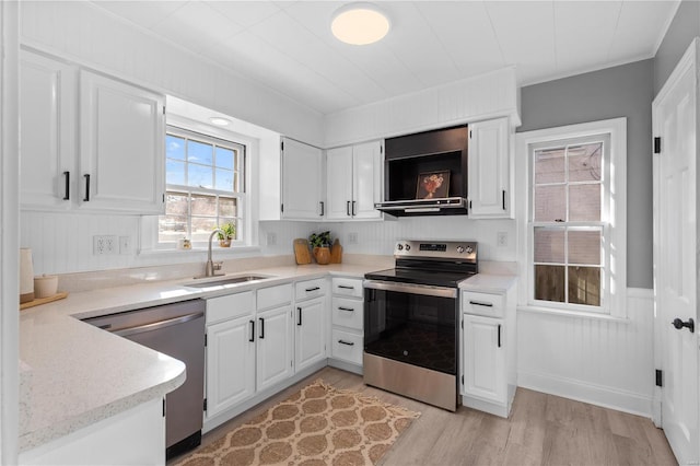 554 S Clay Ave, Saint Louis, MO 63122 - kitchen featuring appliances with stainless steel finishes, a sink, white cabinetry, and crown molding