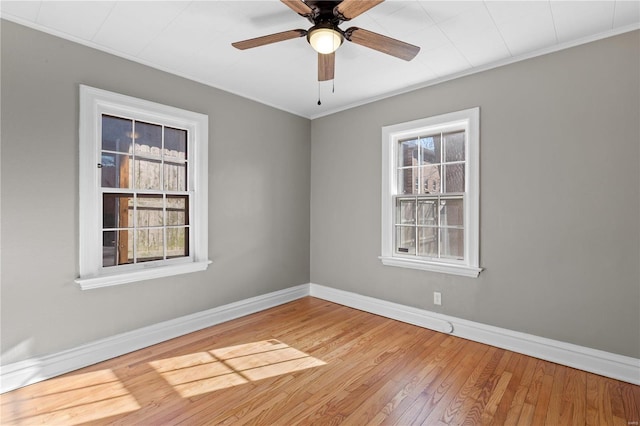 554 S Clay Ave, Saint Louis, MO 63122 - empty room with baseboards, crown molding, wood finished floors, and a ceiling fan