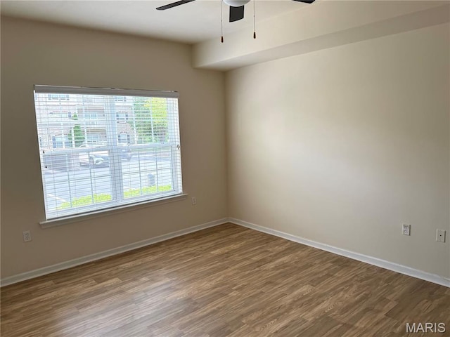 2 Monarch Trace Ct Unit 103, Chesterfield, MO 63017 - unfurnished room with ceiling fan, wood finished floors, and baseboards