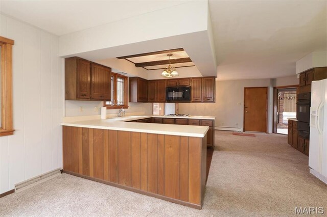 8032 Blue Mound Dr, Saint Rose, IL 62230 - kitchen featuring black appliances, a baseboard radiator, light countertops, and light colored carpet