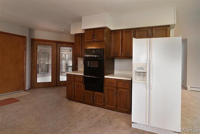 8032 Blue Mound Dr, Saint Rose, IL 62230 - kitchen with white refrigerator with ice dispenser, light carpet, light countertops, a warming drawer, and a baseboard heating unit