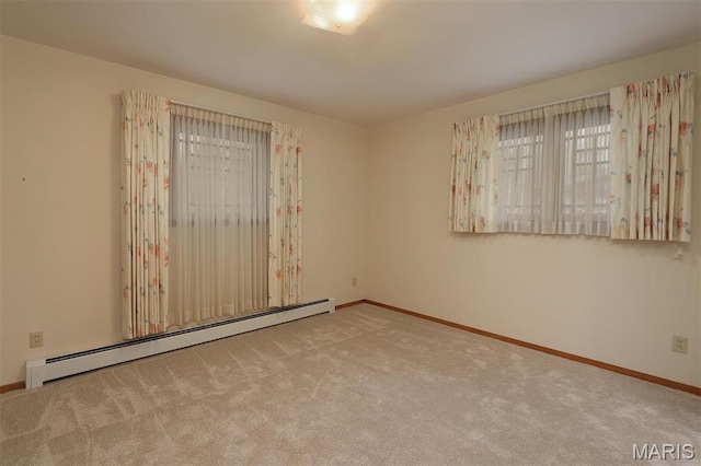 8032 Blue Mound Dr, Saint Rose, IL 62230 - carpeted spare room with a baseboard radiator and baseboards