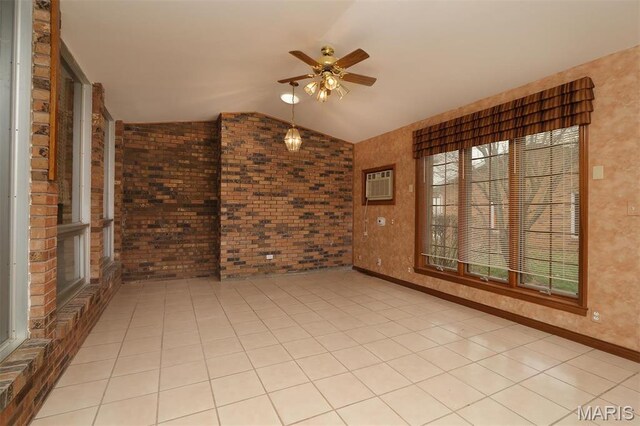 8032 Blue Mound Dr, Saint Rose, IL 62230 - unfurnished room with ceiling fan, vaulted ceiling, brick wall, and a wall unit AC