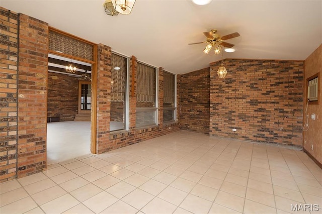 8032 Blue Mound Dr, Saint Rose, IL 62230 - empty room featuring vaulted ceiling, a ceiling fan, and brick wall