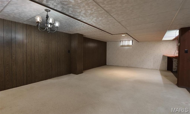 8032 Blue Mound Dr, Saint Rose, IL 62230 - finished below grade area featuring a chandelier, wood walls, a drop ceiling, wallpapered walls, and carpet floors