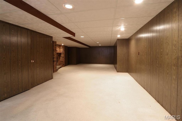 8032 Blue Mound Dr, Saint Rose, IL 62230 - finished below grade area with light carpet, wood walls, and a paneled ceiling