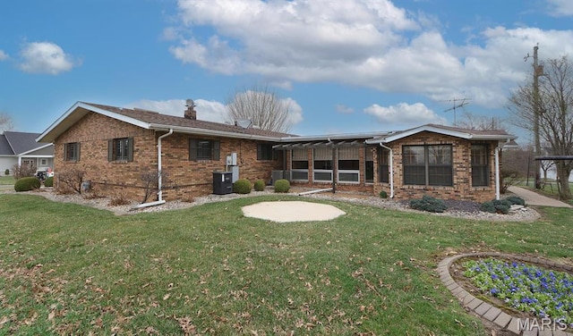 8032 Blue Mound Dr, Saint Rose, IL 62230 - back of house with brick siding, a yard, and a chimney