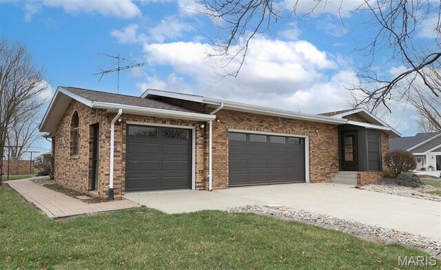 8032 Blue Mound Dr, Saint Rose, IL 62230 - view of front of home with an attached garage, brick siding, and concrete driveway