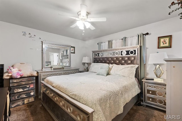 2755 Patterson Rd, Florissant, MO 63031 - bedroom with dark colored carpet and ceiling fan