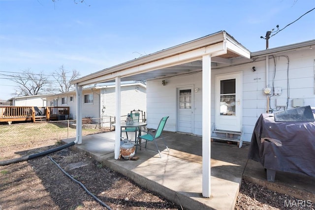2755 Patterson Rd, Florissant, MO 63031 - view of patio with a wooden deck and area for grilling