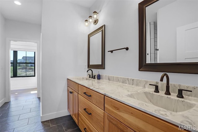 1520 Oglesby Dr, Edwardsville, IL 62025 - full bath with double vanity, baseboards, and tile patterned floors