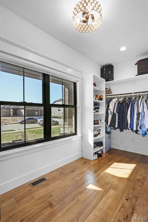 1520 Oglesby Dr, Edwardsville, IL 62025 - walk in closet with wood finished floors