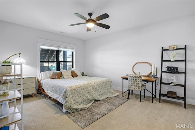 1520 Oglesby Dr, Edwardsville, IL 62025 - bedroom with light carpet, a ceiling fan, and baseboards