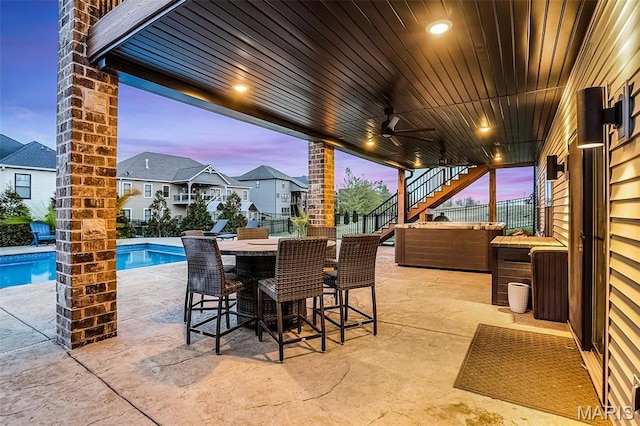 1520 Oglesby Dr, Edwardsville, IL 62025 - view of patio / terrace featuring stairs, fence, ceiling fan, exterior bar, and a hot tub