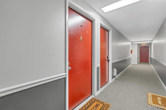 1523 S 10th St Unit 206, Saint Louis, MO 63104 - hallway featuring carpet floors and baseboards