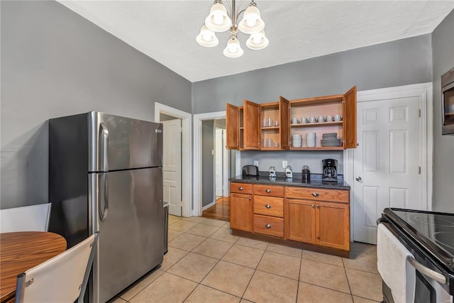 2107 Russell Blvd, Saint Louis, MO 63104 - kitchen with appliances with stainless steel finishes, a chandelier, brown cabinets, open shelves, and dark countertops
