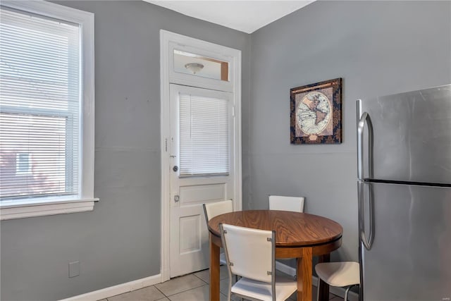 2107 Russell Blvd, Saint Louis, MO 63104 - dining area with light tile patterned floors