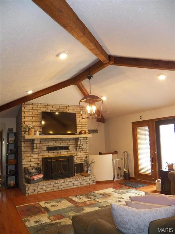 417 Carriage Pl, Lebanon, MO 65536 - living room with wood finished floors and a fireplace
