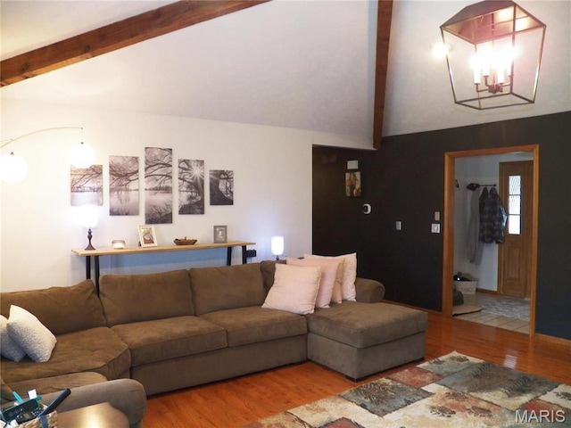 417 Carriage Pl, Lebanon, MO 65536 - living area with wood finished floors and a chandelier