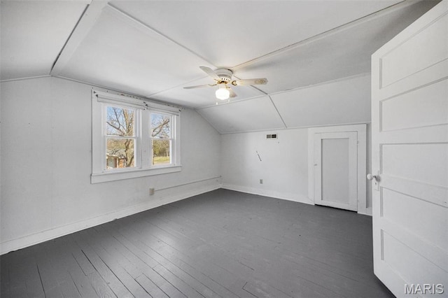 1052 Market St, Saint Genevieve, MO 63670 - additional living space featuring vaulted ceiling, baseboards, a ceiling fan, and dark wood-type flooring