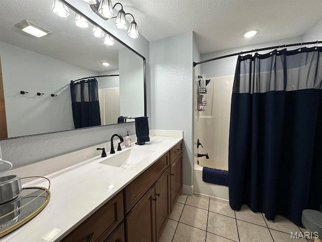 14348 Hidden Trails Cir, Dexter, MO 63841 - full bathroom featuring double vanity, a textured ceiling, tile patterned flooring, and shower / tub combo with curtain