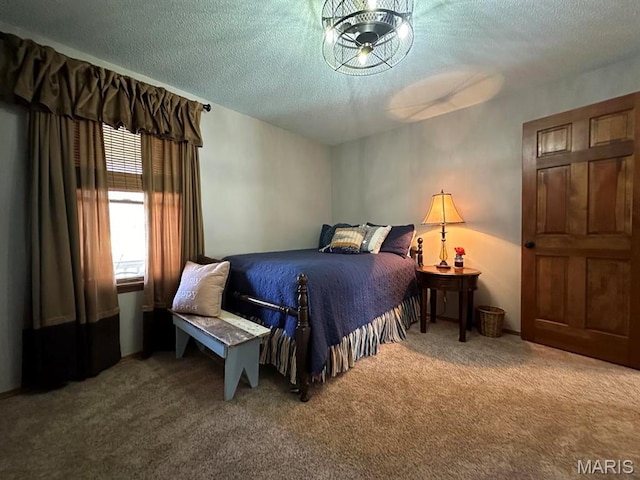 14348 Hidden Trails Cir, Dexter, MO 63841 - carpeted bedroom with a textured ceiling