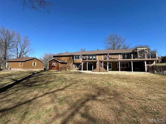 14348 Hidden Trails Cir, Dexter, MO 63841 - rear view of house with stairway and a wooden deck