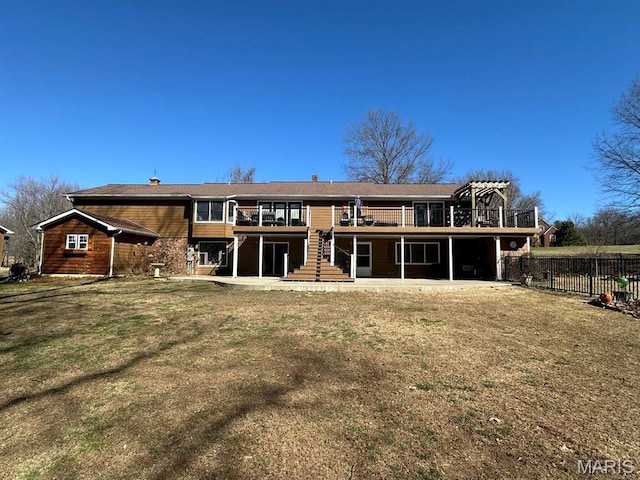 14348 Hidden Trails Cir, Dexter, MO 63841 - rear view of property featuring stairway and a patio