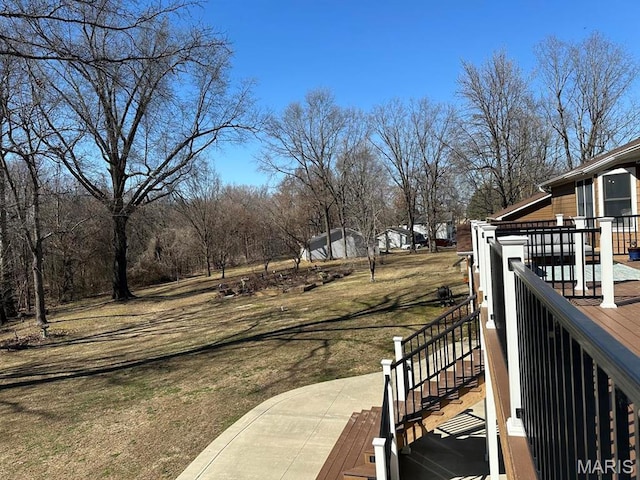 14348 Hidden Trails Cir, Dexter, MO 63841 - view of grassy yard with stairway and a wooden deck