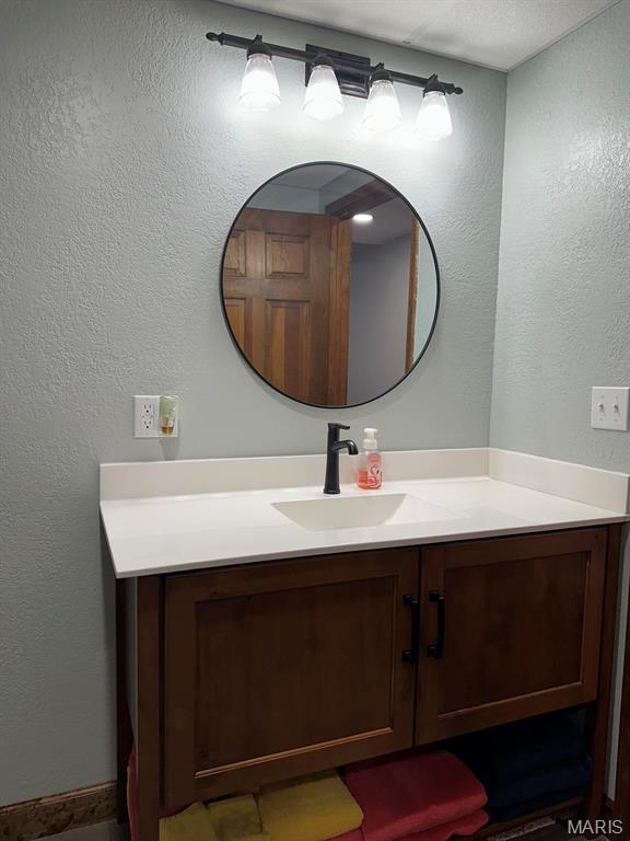 14348 Hidden Trails Cir, Dexter, MO 63841 - bathroom featuring vanity