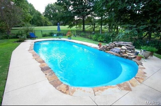 14348 Hidden Trails Cir, Dexter, MO 63841 - view of swimming pool with a fenced backyard and a patio