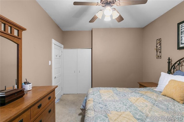 4486 Laclede Ave Unit 4486, Saint Louis, MO 63108 - bedroom with light colored carpet, a closet, and ceiling fan