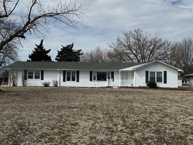 ranch-style house featuring covered porch