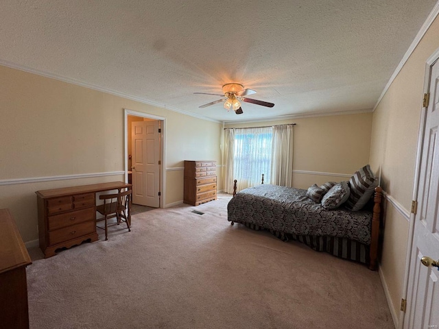 bedroom with light colored carpet, crown molding, a textured ceiling, and ceiling fan