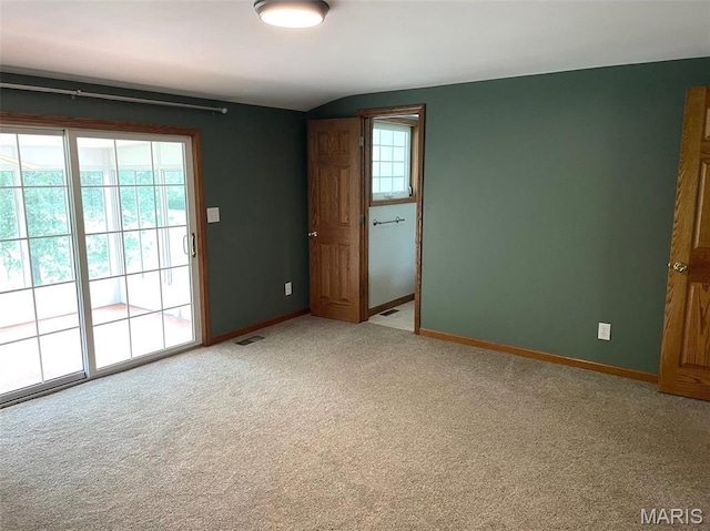 22 Coachman Ln, Villa Ridge, MO 63089 - spare room featuring light colored carpet and baseboards