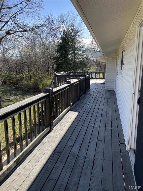 22 Coachman Ln, Villa Ridge, MO 63089 - view of wooden deck